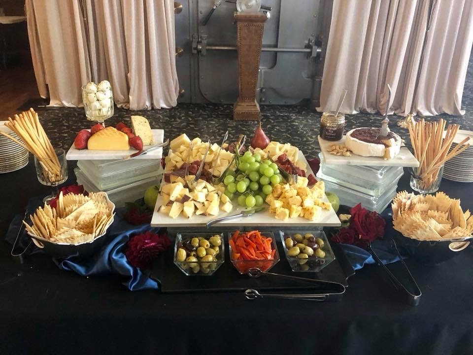 Elegant charcuterie and cheese display for wedding catering
